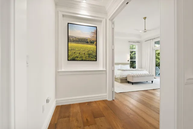 a bath room with a sink and mirror