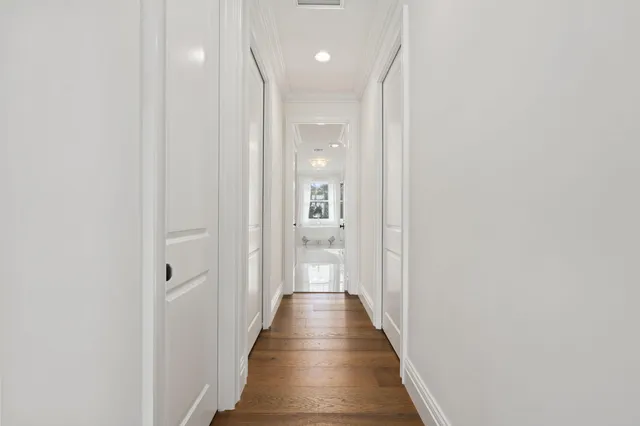 a living room with fireplace furniture and a book shelf