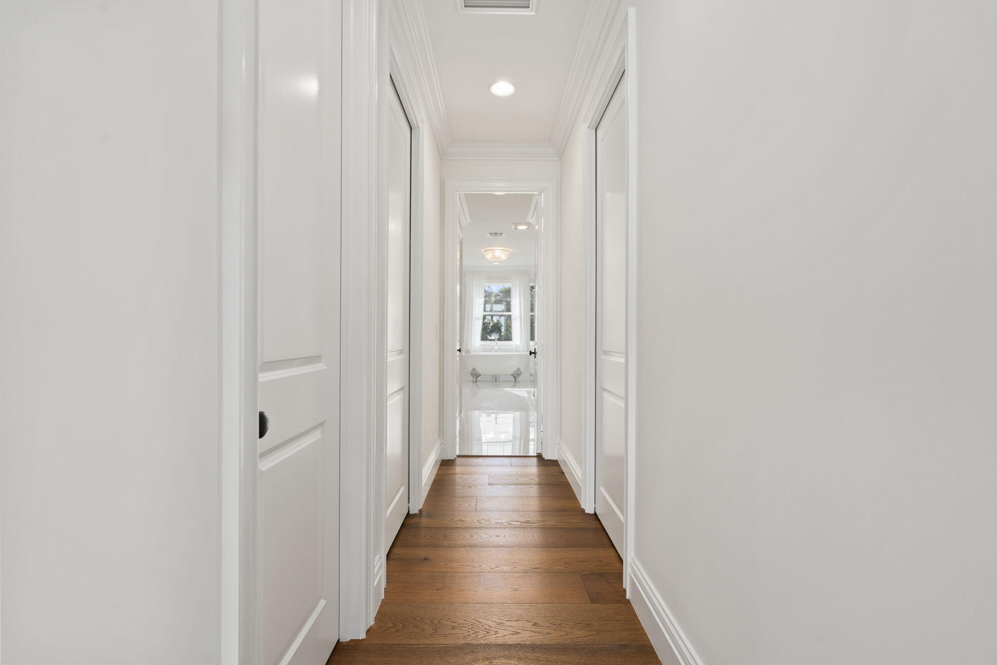 54 South Sewalls Point Road Sewall's Point, FL 34996 - Photo 21 of 68 a view of a hallway with wooden floor