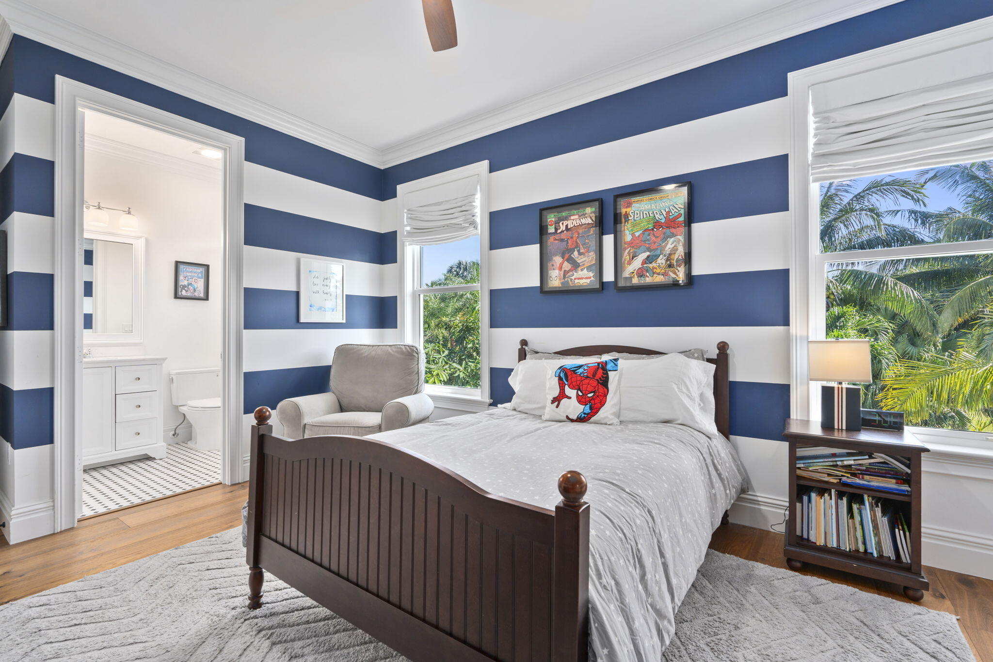 54 South Sewalls Point Road Sewall's Point, FL 34996 - Photo 27 of 68 a bedroom with a bed and wooden floor