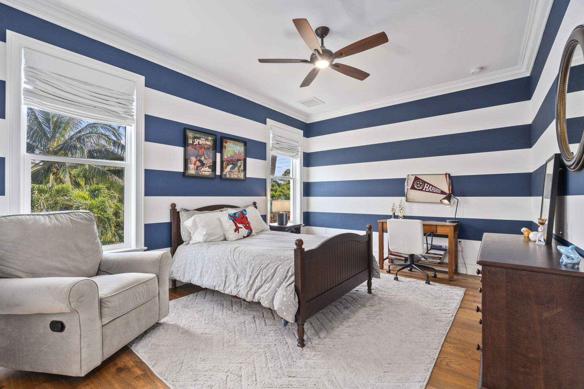 54 South Sewalls Point Road Sewall's Point, FL 34996 - Photo 28 of 68 a bedroom with a bed couch and a window