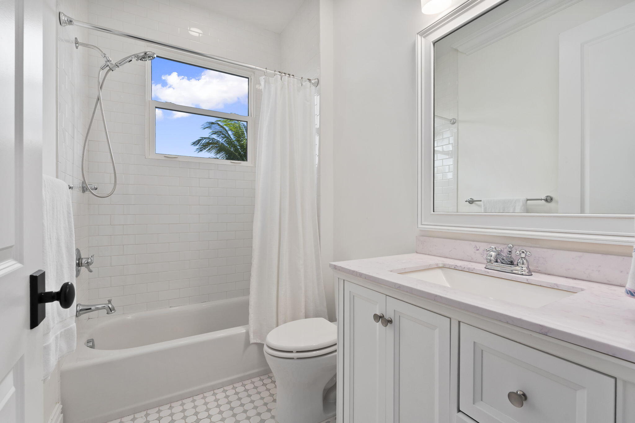 54 South Sewalls Point Road Sewall's Point, FL 34996 - Photo 33 of 68 a bathroom with a sink toilet and shower