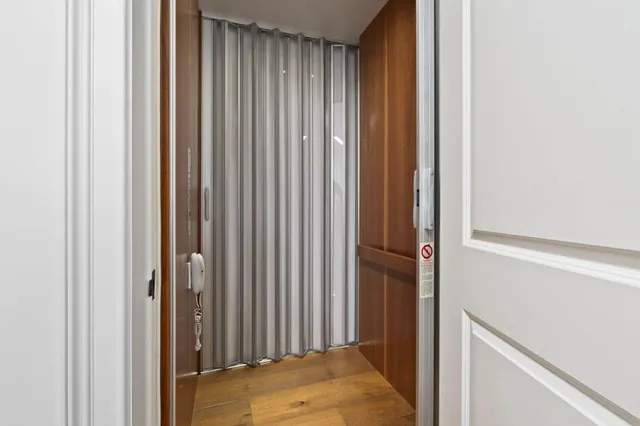 a view of a balcony with chairs