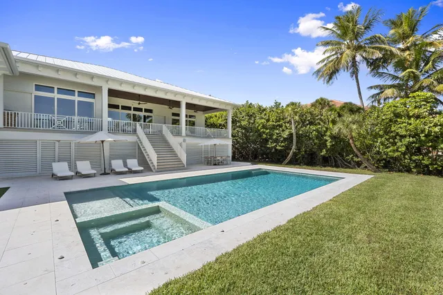 a view of a chairs and table on the wooden floor