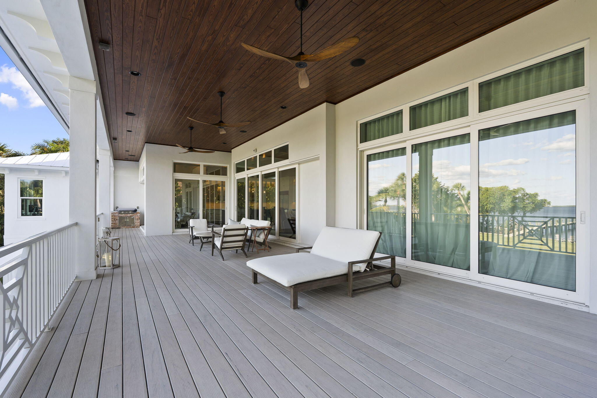 54 South Sewalls Point Road Sewall's Point, FL 34996 - Photo 50 of 68 a living room with furniture and a large window