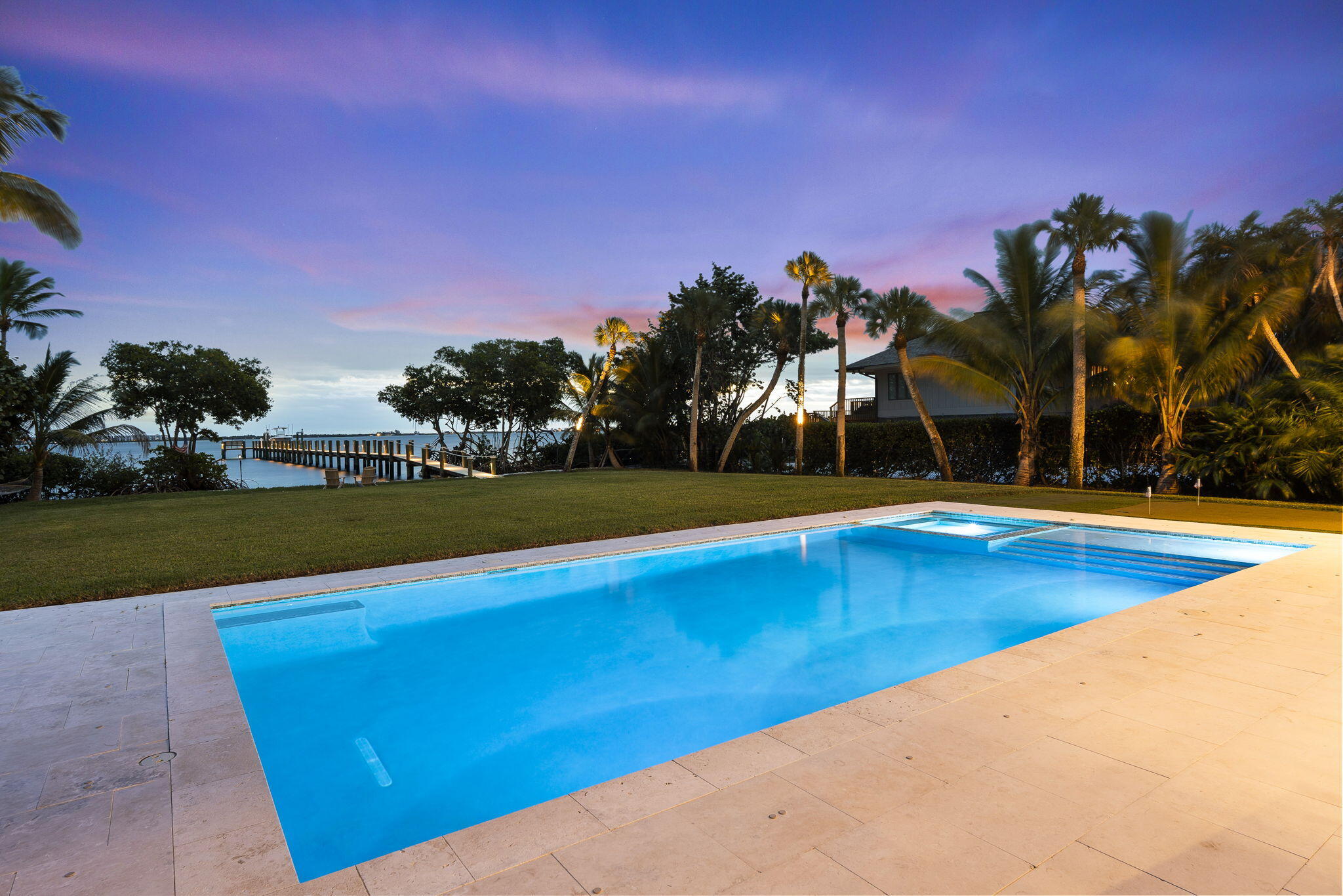 54 South Sewalls Point Road Sewall's Point, FL 34996 - Photo 62 of 68 a view of swimming pool with outdoor seating and city view