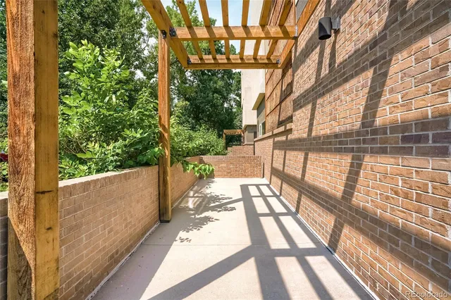 a view of balcony with wooden floor