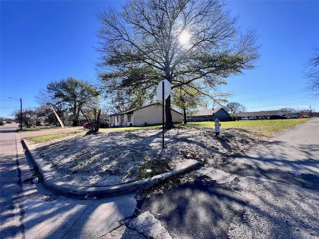 a view of swimming pool with a yard
