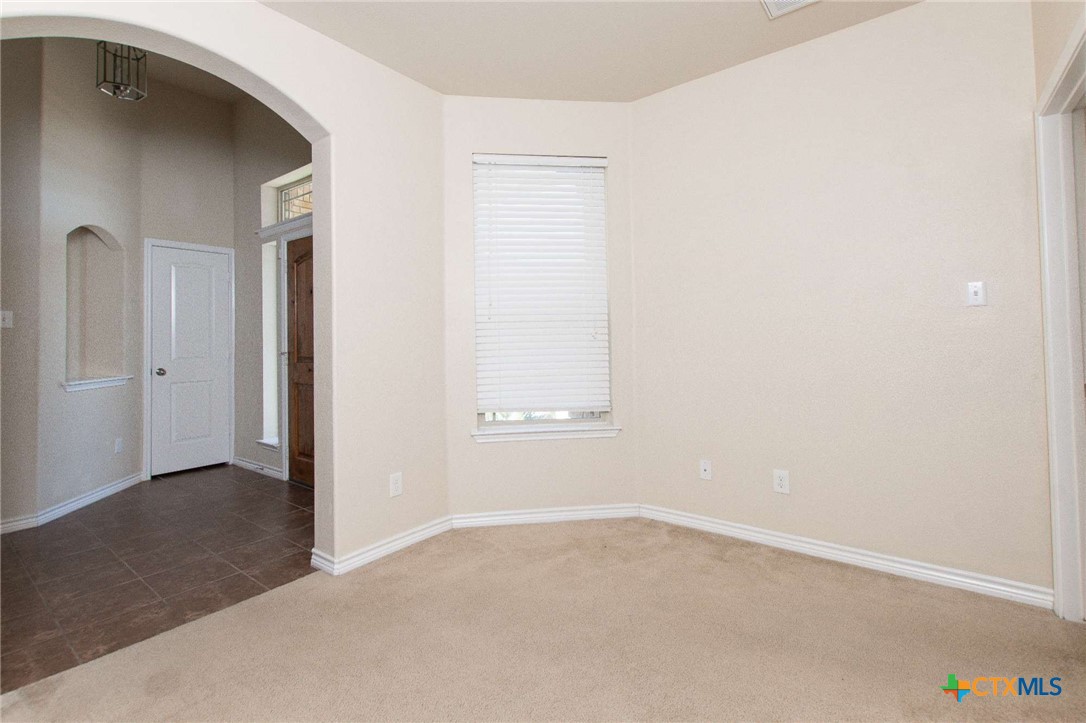 3302 Vineyard Trail Harker Heights, TX 76548 - Photo 2 of 29 an empty room with windows and closet