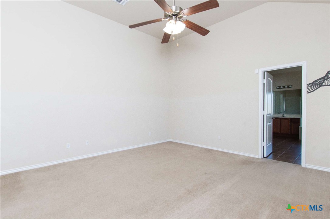3302 Vineyard Trail Harker Heights, TX 76548 - Photo 23 of 29 an empty room with closet and fan