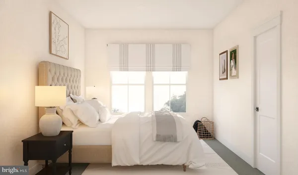 a bedroom with bed and window