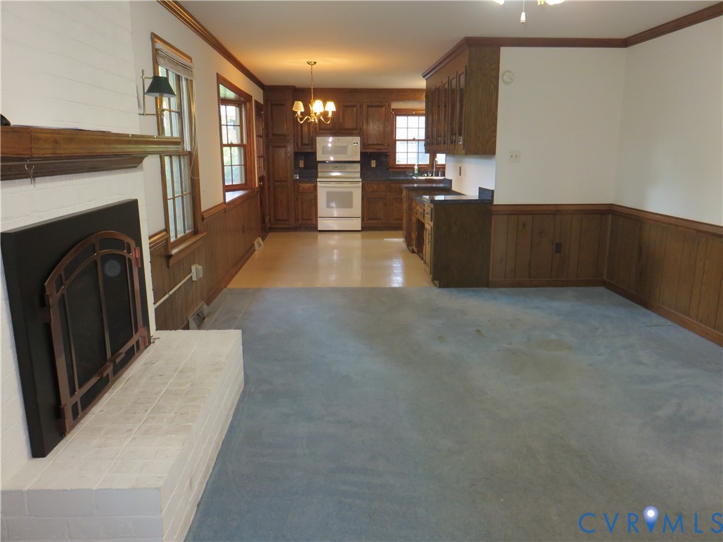 8379 Quailfield Road Mechanicsville, VA 23116 - Photo 29 of 56 a view of living room with furniture and fireplace