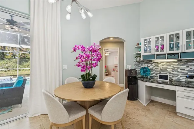 a view of a hallway view with wooden floor and closet