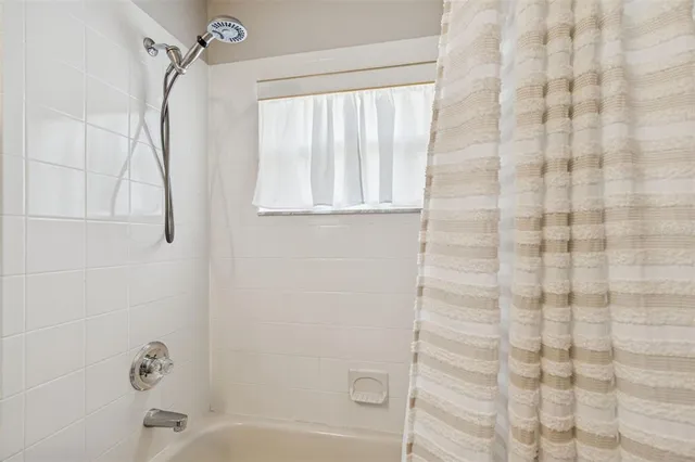 a bathroom with a sink double vanity and a mirror