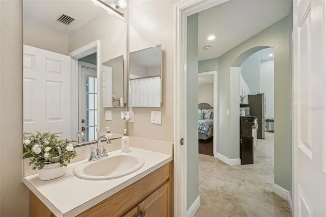 a view of a house with a yard and sitting area