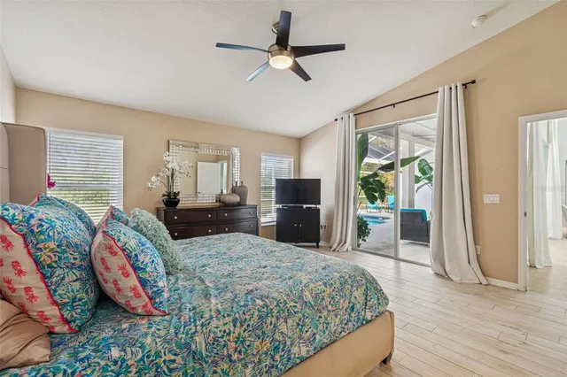 a sign that is sitting in front of flowers