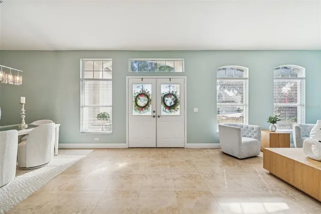 a living room with furniture and window