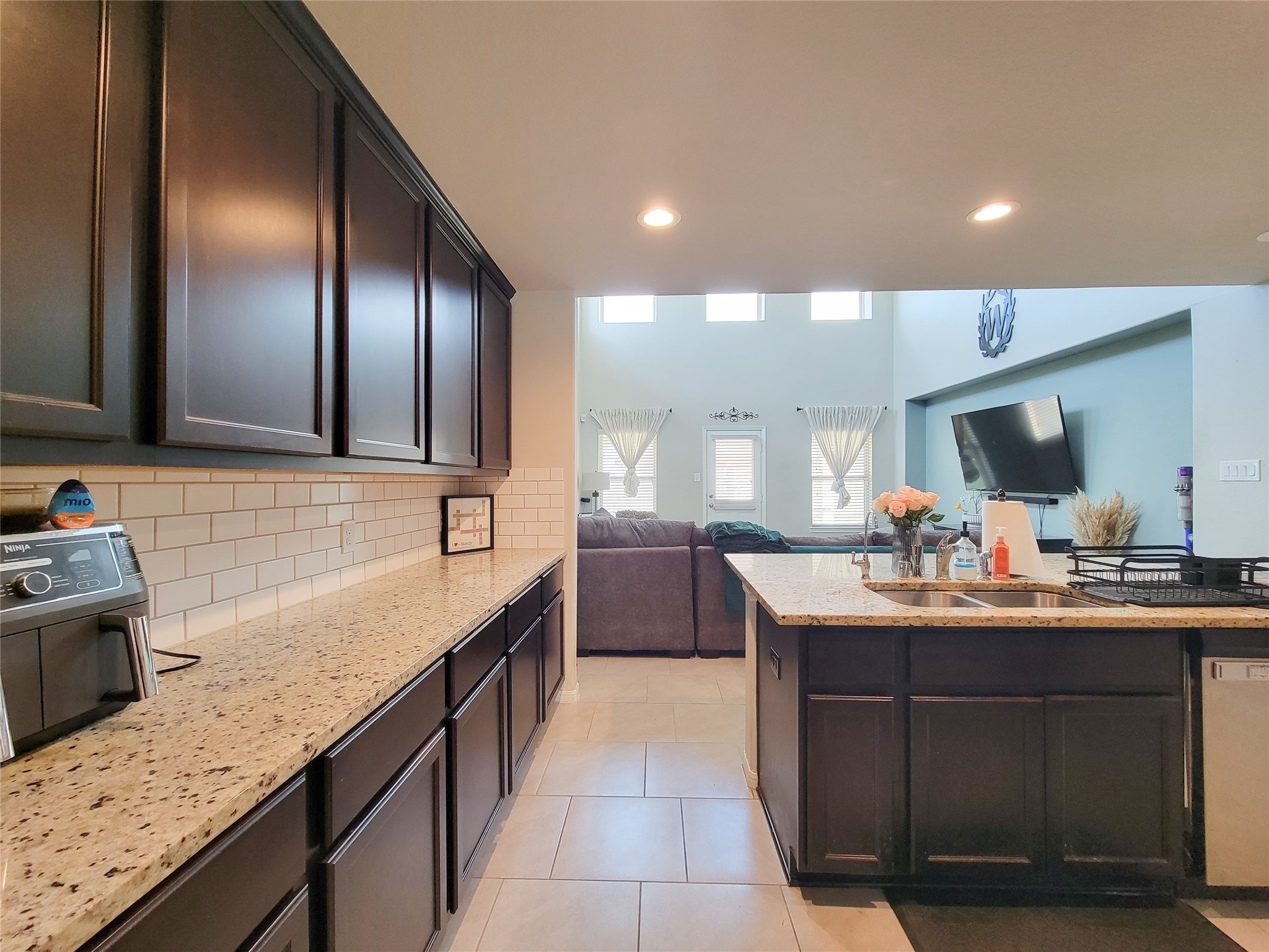 8003 Ecru Lane Rosharon, TX 77583 - Photo 14 of 43 a kitchen with sink cabinets and window