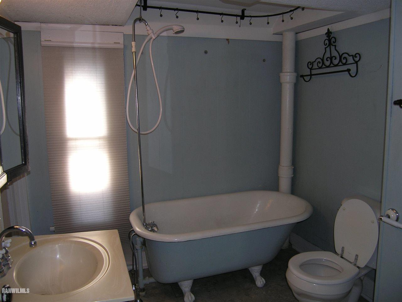 313 South Bench Street Galena, IL 61036 - Photo 19 of 19 a bathroom with a sink toilet and shower