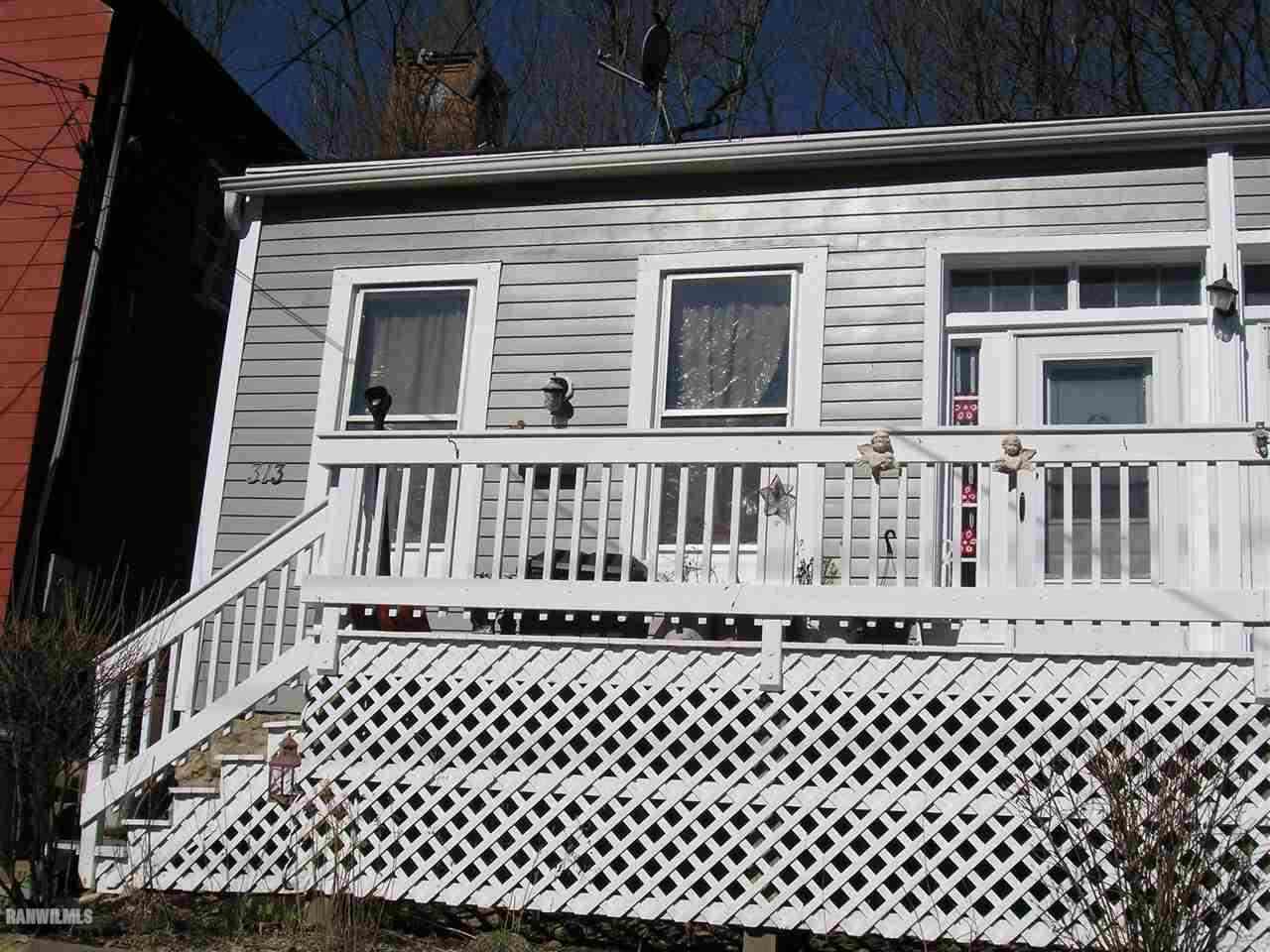313 South Bench Street Galena, IL 61036 - Photo 2 of 19 a view of a house with wooden deck