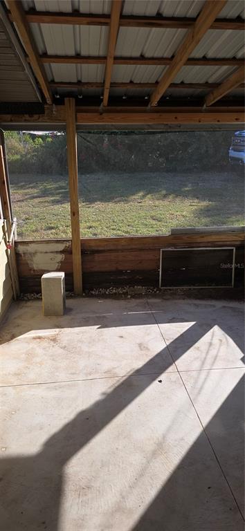 315 Virginia Street Frostproof, FL 33843 - Photo 7 of 23 a view of room with wooden floor