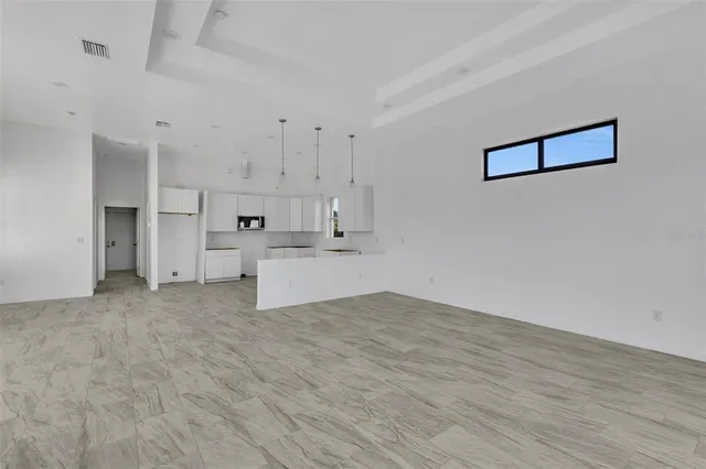 a view of kitchen with wooden floor