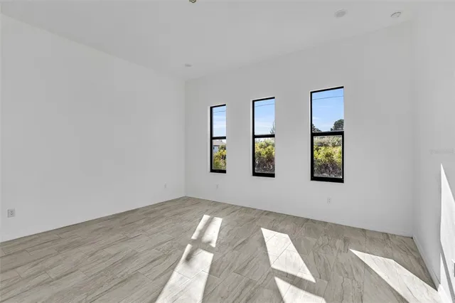 an empty room with windows