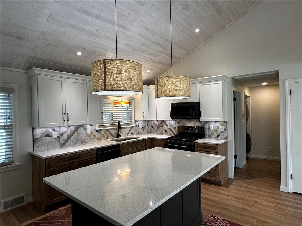 219 Meadowbrook Road Hermitage, PA 16148 - Photo 4 of 19 vaulted ceiling opens up the entire room