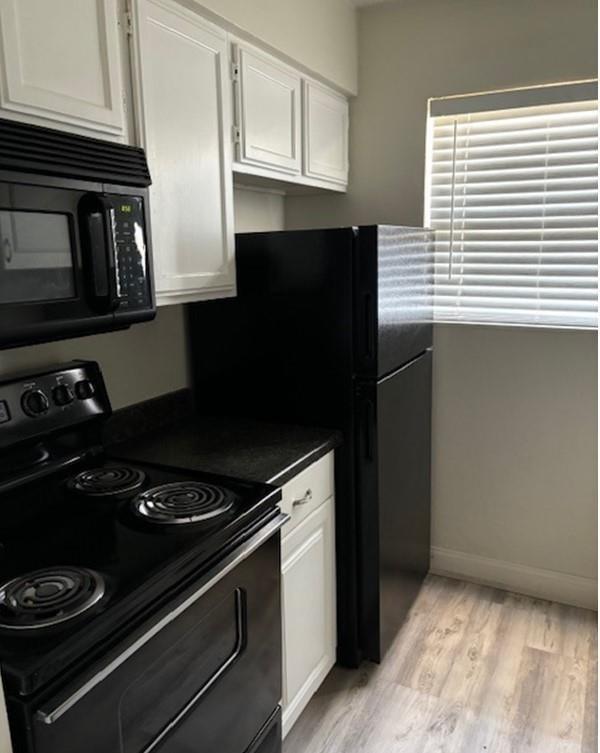 2729 Hurstview Drive, Unit A Hurst, TX 76054 - Photo 5 of 21 Galley kitchen