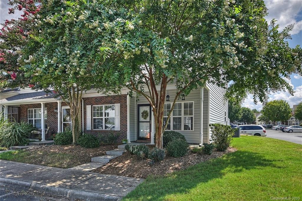 231 Primrose Walk Fort Mill, SC 29715 - Photo 2 of 34 a front view of a house with garden