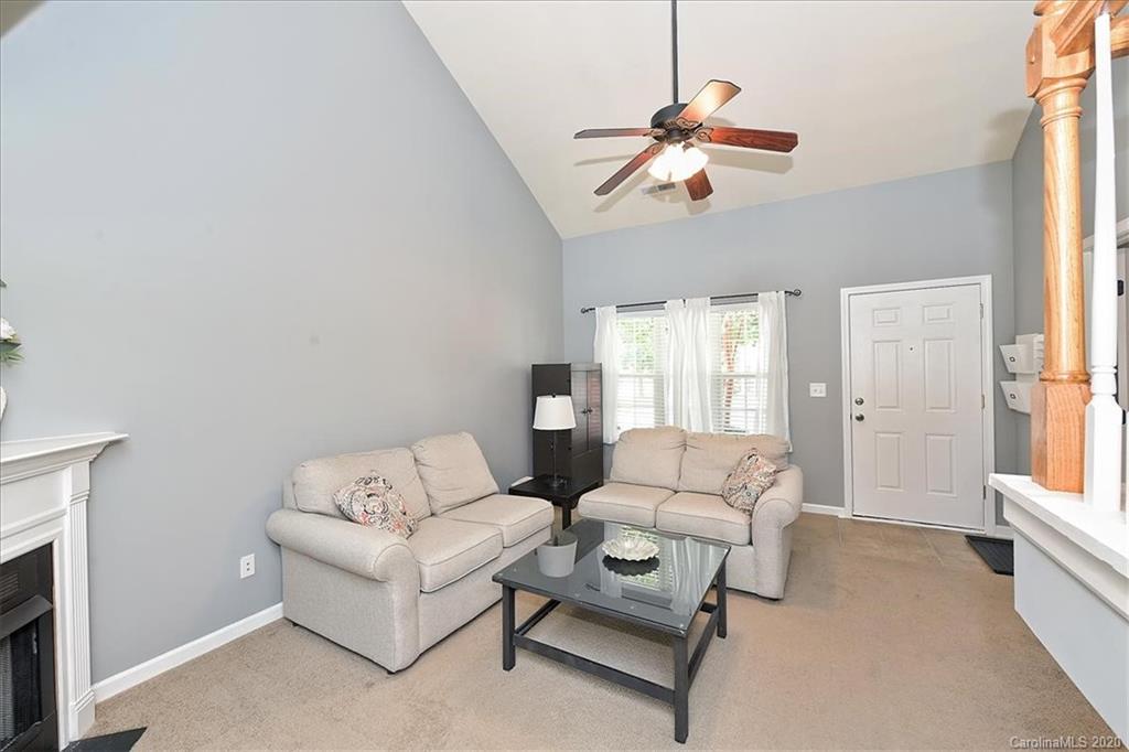 231 Primrose Walk Fort Mill, SC 29715 - Photo 13 of 34 a living room with furniture and a window