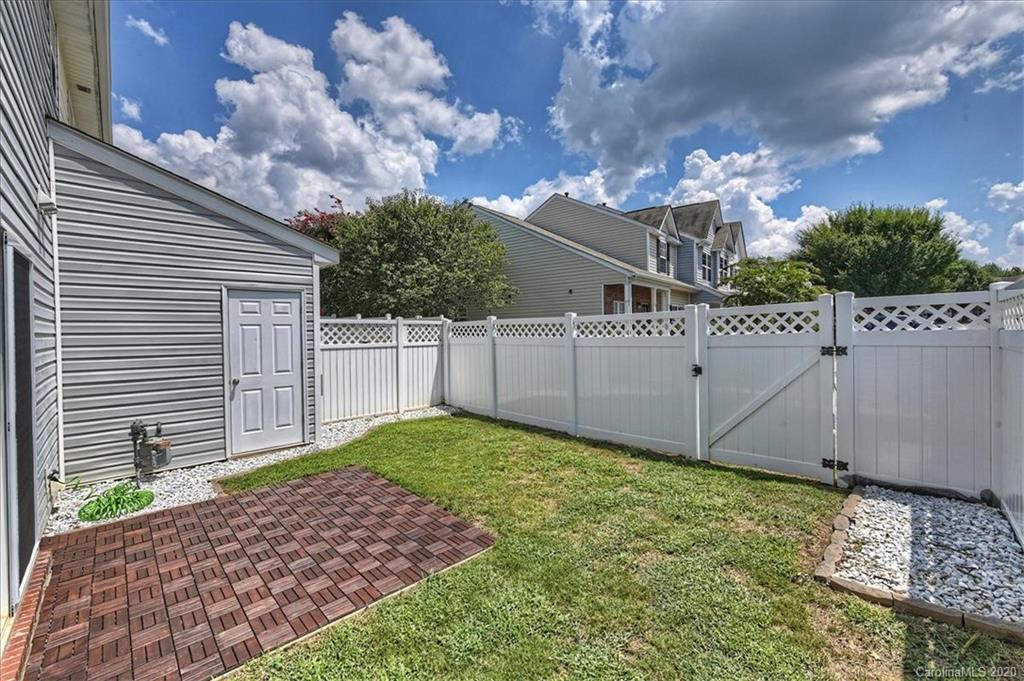 231 Primrose Walk Fort Mill, SC 29715 - Photo 22 of 34 a view of a backyard