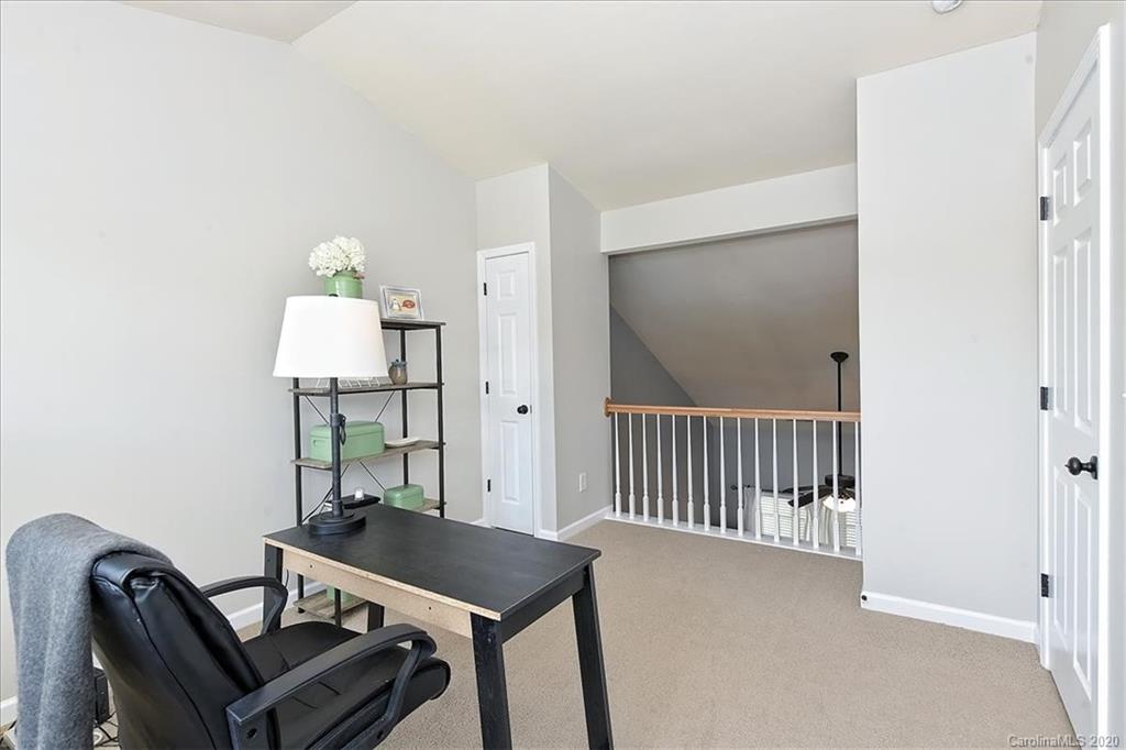 231 Primrose Walk Fort Mill, SC 29715 - Photo 28 of 34 a view of a hallway with workspace