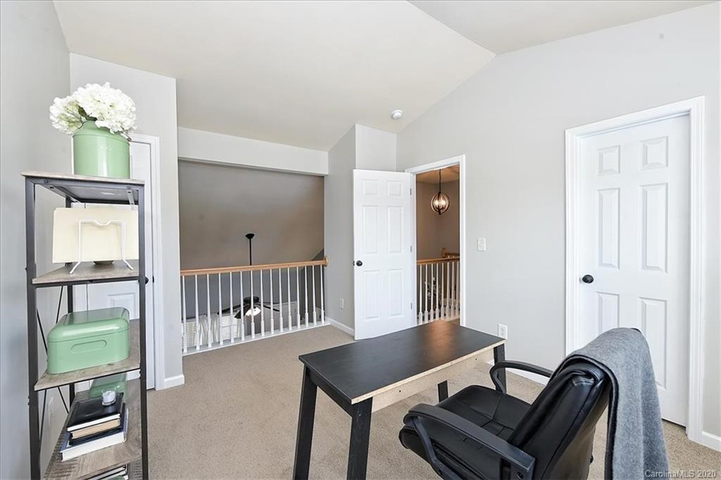 231 Primrose Walk Fort Mill, SC 29715 - Photo 29 of 34 a view of a workspace with furniture and a window