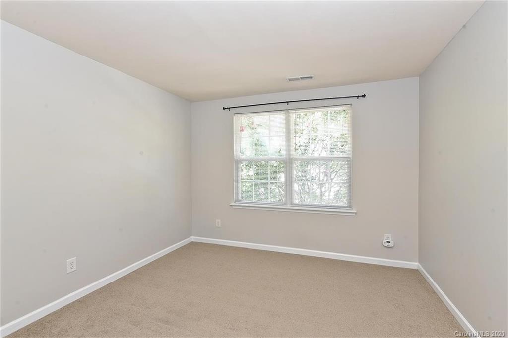 231 Primrose Walk Fort Mill, SC 29715 - Photo 31 of 34 an empty room with a window