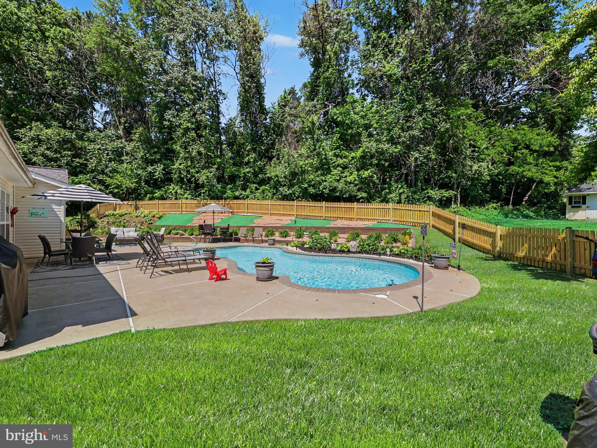 7462 Keith Road Warrenton, VA 20186 - Photo 30 of 37 Pool with Lawn area