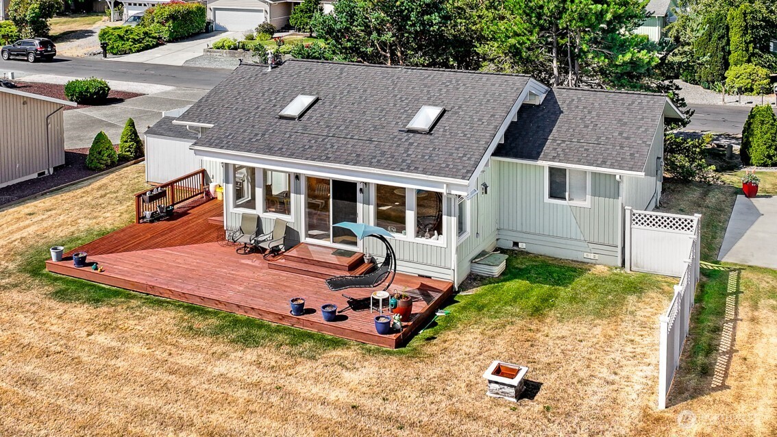 8192 Sehome Road Blaine, WA 98230 - Photo 1 of 40 an aerial view of a house with swimming pool and large trees