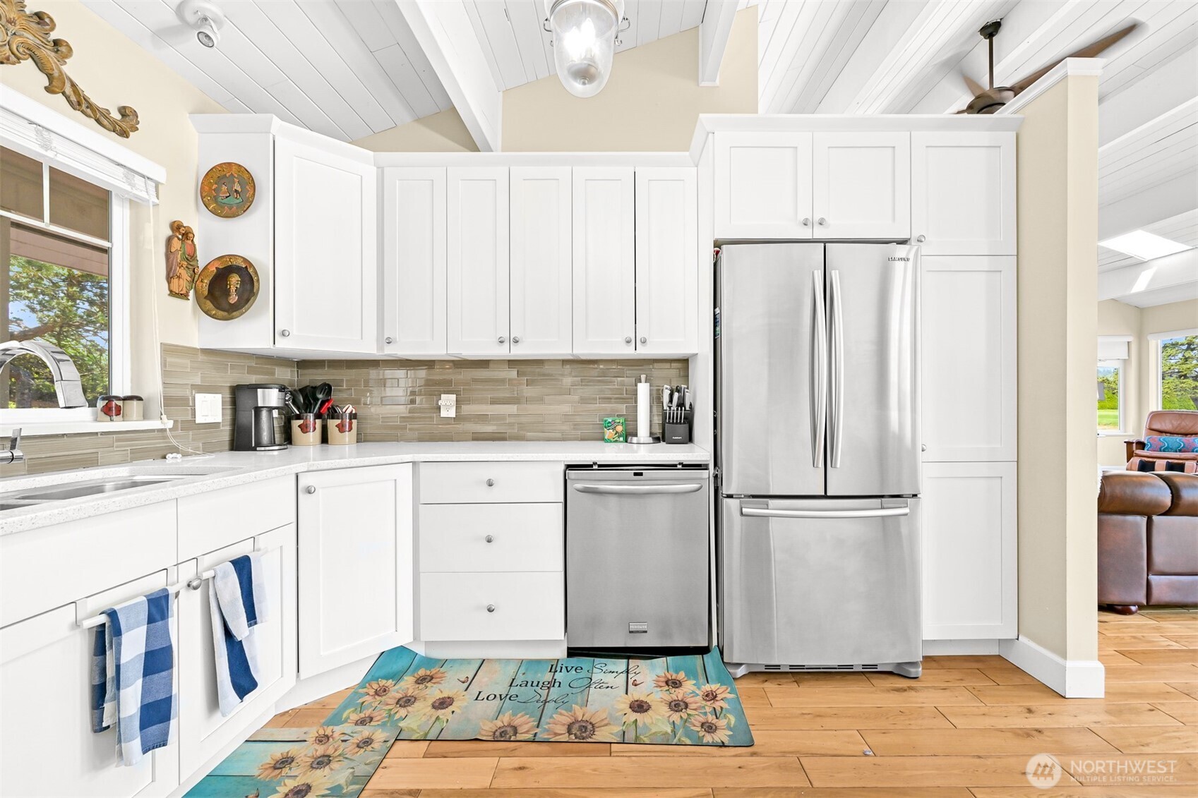 8192 Sehome Road Blaine, WA 98230 - Photo 13 of 40 a kitchen with appliances cabinets and a counter top space