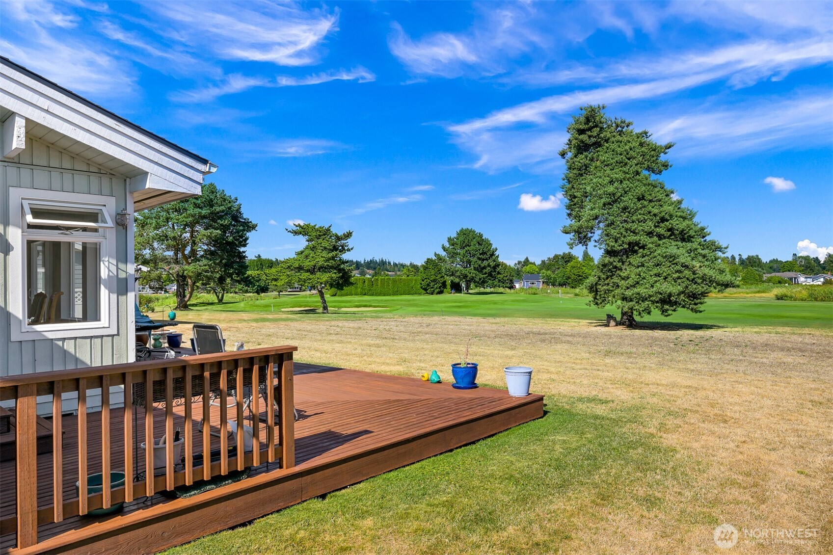 8192 Sehome Road Blaine, WA 98230 - Photo 31 of 40 a view of a wooden deck with a yard