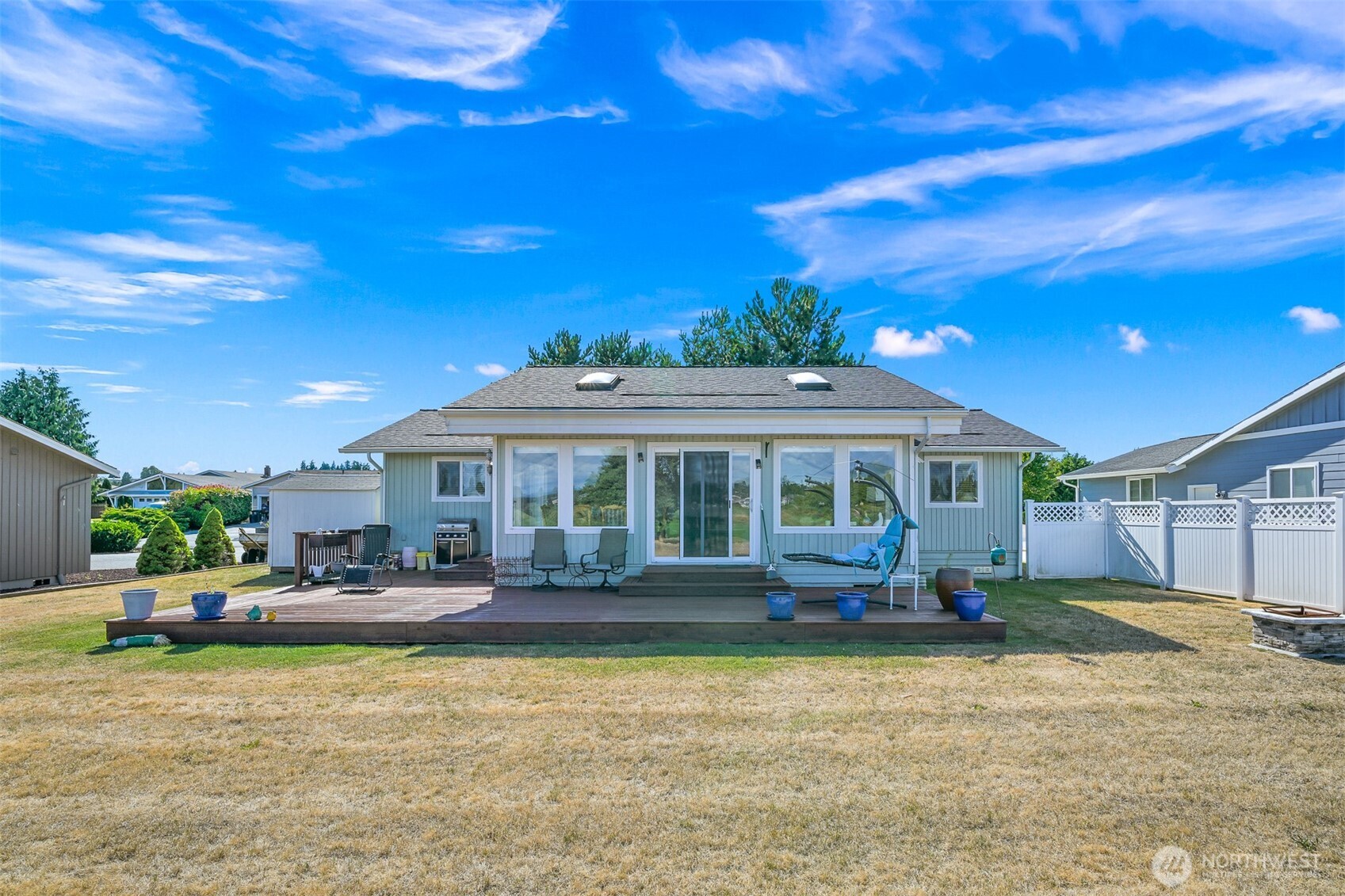 8192 Sehome Road Blaine, WA 98230 - Photo 32 of 40 a front view of a house with a garden