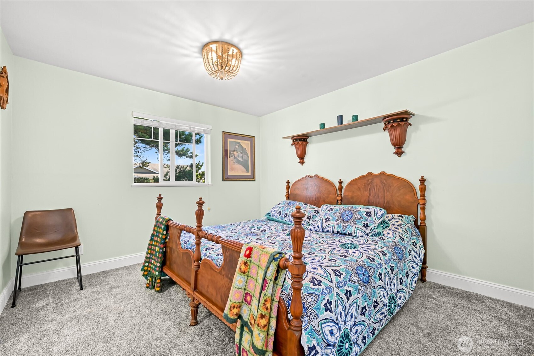 8192 Sehome Road Blaine, WA 98230 - Photo 4 of 40 a bedroom with a bed and a lamp on the dresser