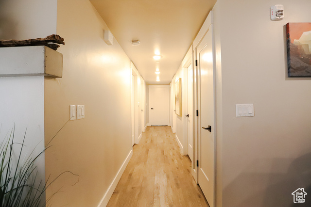2331 Mesa Road, Unit E3 Moab, UT 84532 - Photo 16 of 71 Hall with light wood-style floors and baseboards