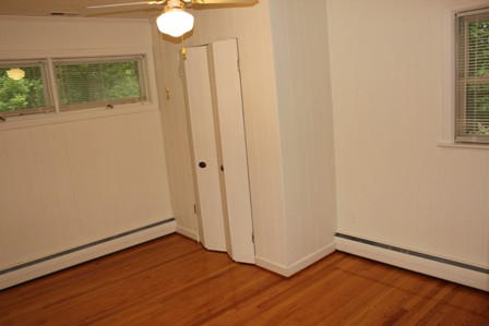 1731 Rutrough Road Southeast Roanoke, VA 24014 - Photo 13 of 34 a view of a room with wooden floor and sliding window
