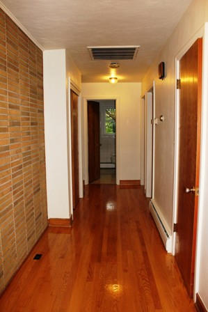 1731 Rutrough Road Southeast Roanoke, VA 24014 - Photo 16 of 34 a view of a hallway with wooden floor