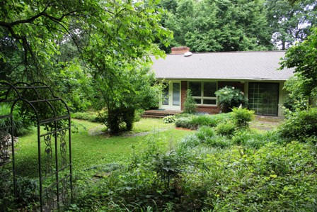 1731 Rutrough Road Southeast Roanoke, VA 24014 - Photo 3 of 34 a front view of a house with garden