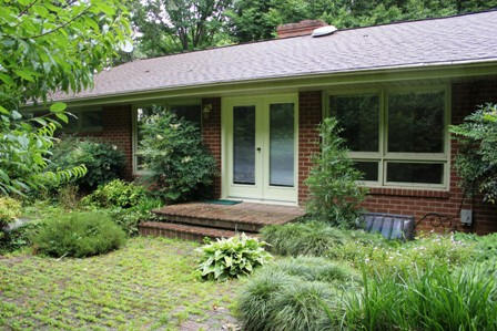 1731 Rutrough Road Southeast Roanoke, VA 24014 - Photo 30 of 34 a view of a house with a garden