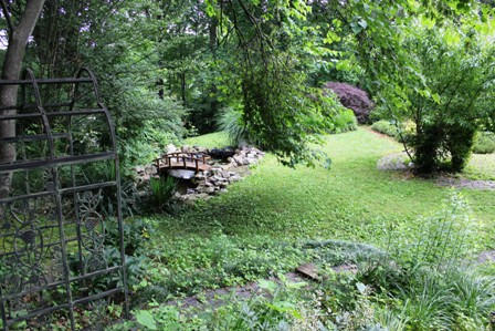 1731 Rutrough Road Southeast Roanoke, VA 24014 - Photo 33 of 34 a backyard of a house with lots of green space