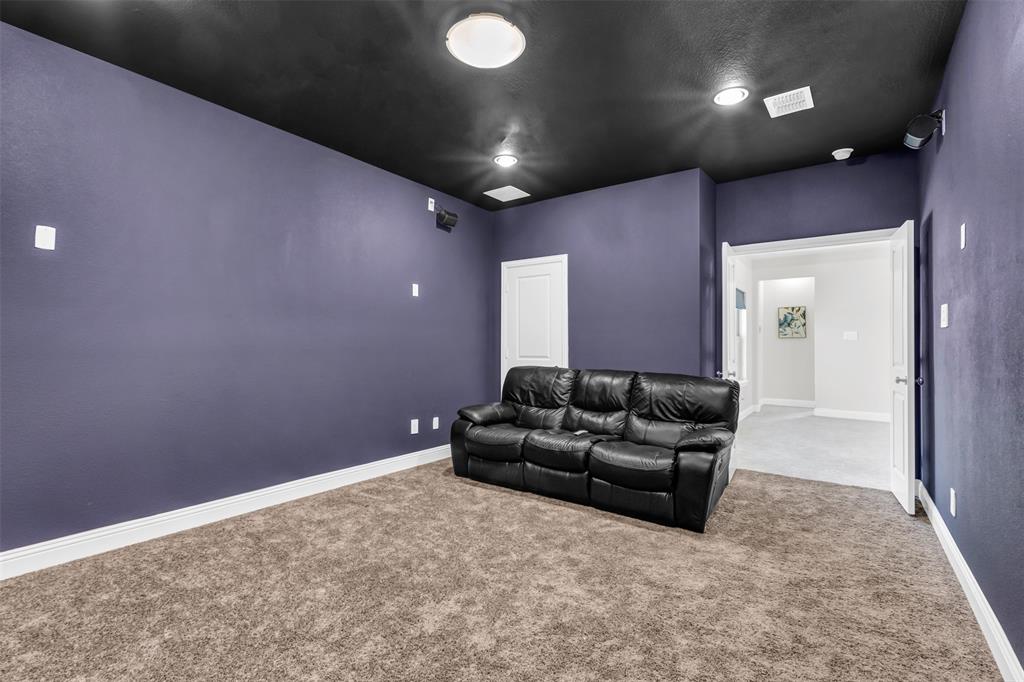 3511 Solaro Lane Rockwall, TX 75087 - Photo 24 of 40 a living room with furniture and a couch