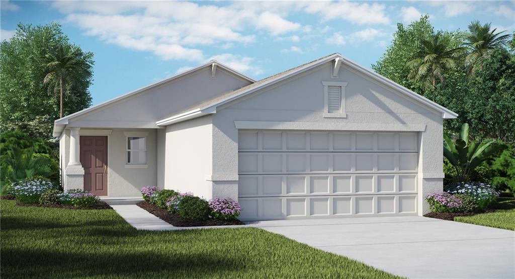 6948 Emerald Spring Loop New Port Richey, FL 34653 - Photo 1 of 1 a front view of a house with a yard