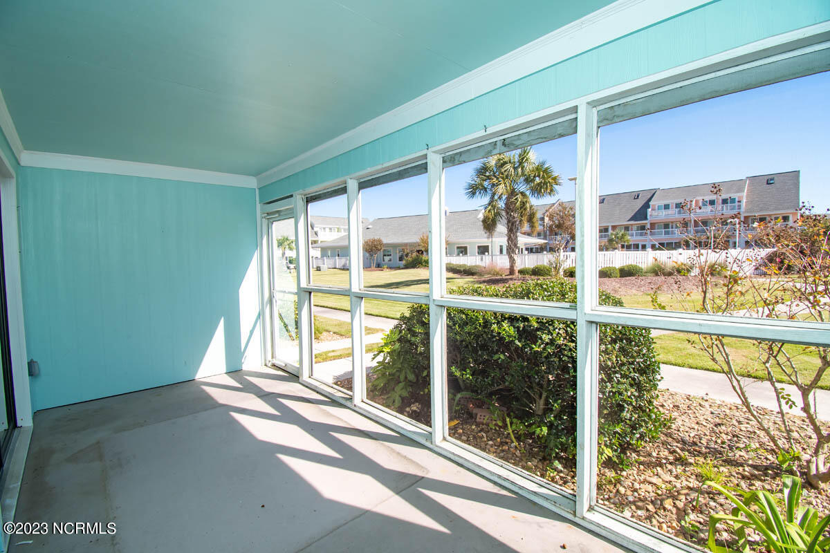9201 Coast Guard Road, Unit G110 Emerald Isle, NC 28594 - Photo 14 of 33 Screened Porch